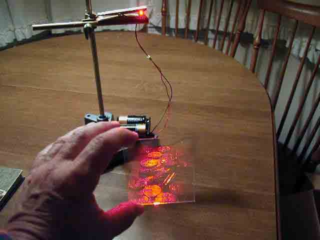 View virtual image of transmission hologram